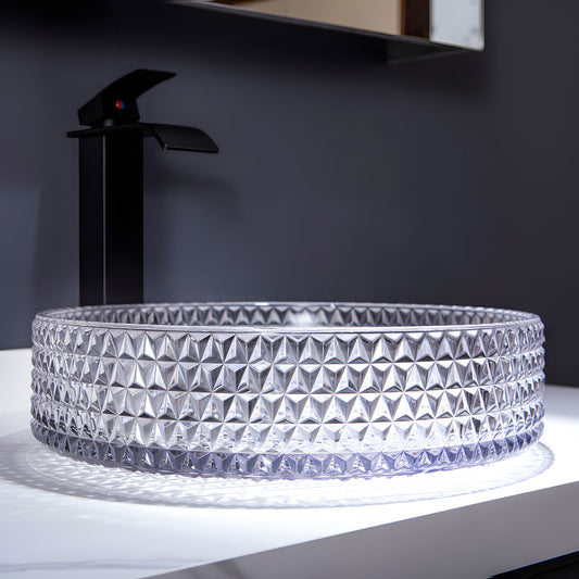 Side view of thick round transparent glass vessel sink with full diamond carving, luxury above counter bathroom basin