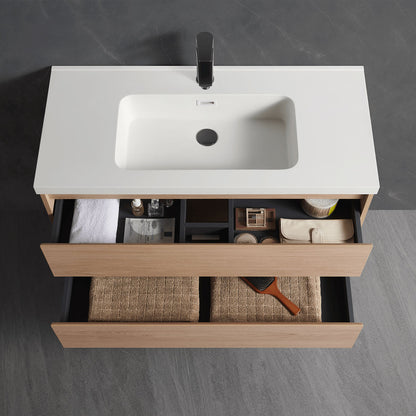 Open drawer storage close-up of floating single sink vanity, built-in compartments to organize bathroom toiletries