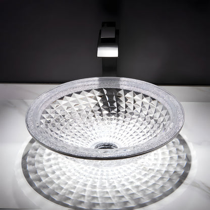 Round diamond embossed clear tempered glass vessel sink, crystal textured wash basin on white marble countertop with modern black faucet