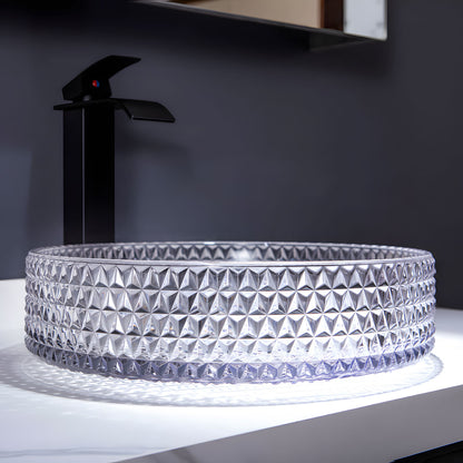 Side view of thick round transparent glass vessel sink with full diamond carving, luxury above counter bathroom basin
