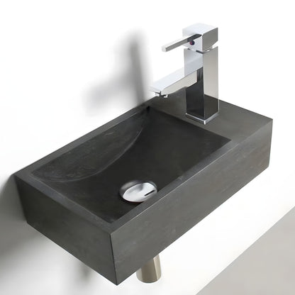 Small rectangular integrated wall mounted black natural stone wash basin with matte stone texture